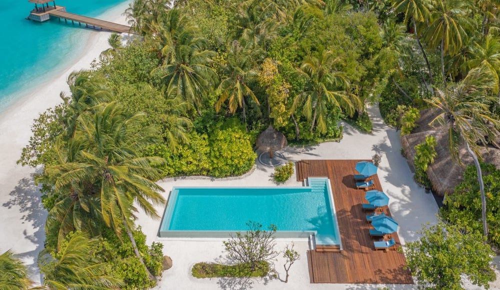 naladhu private island maldives swimming pool 2