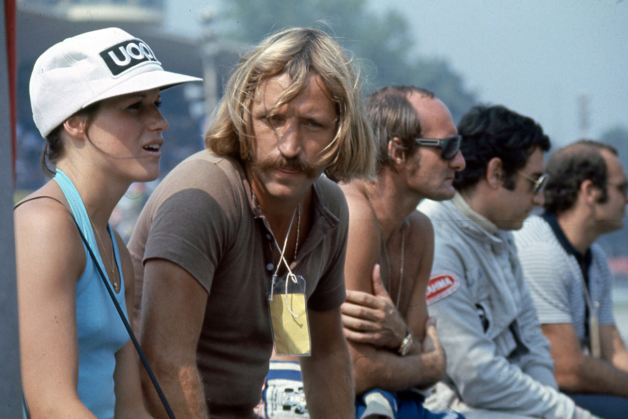 Claude Duboc and girlfriend sitting next to Mike Hailwood and Carlos Pace at the F1 race at Monza in 1973