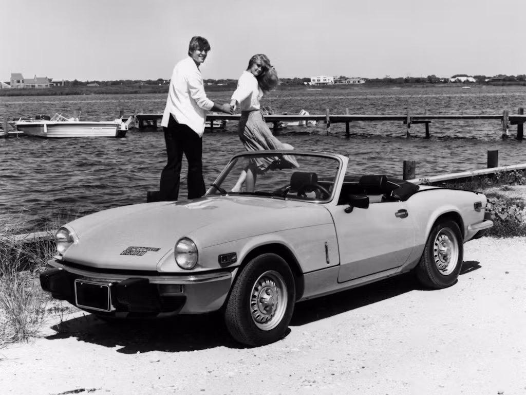 Buyers Guide: 1962-80 Triumph Spitfire 10 1979 Triumph Spitfire couple black white