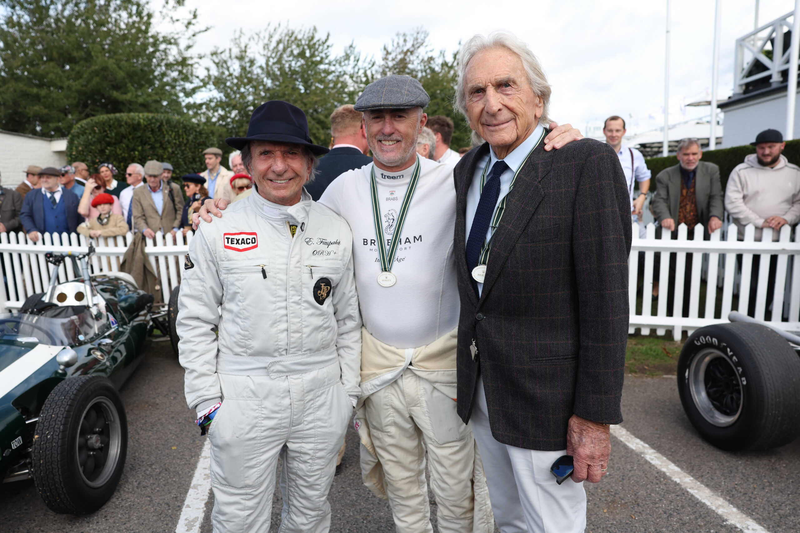 Emerson Fittipaldi David Brabham and Derek Bell at the Goodwood Revival 2026 presented by DUNLOP Ph. by PA Media scaled