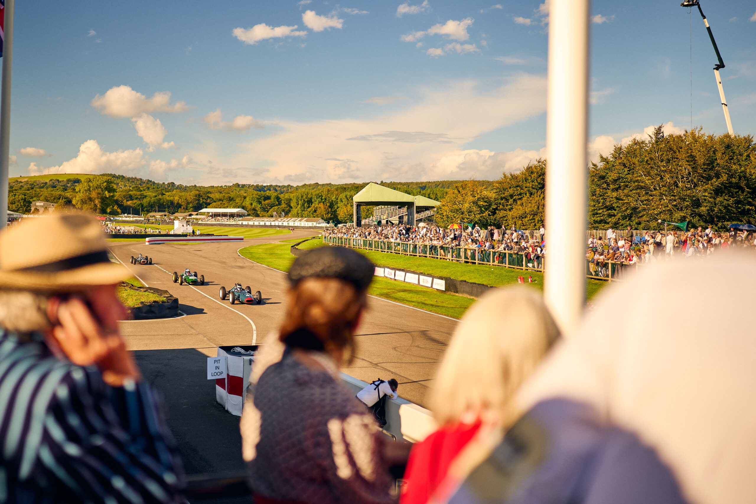 The 2026 Goodwood Revival Highlights 3 Visitors watching the racing at the 2024 Goodwood Revival. Ph. by Dominic James scaled